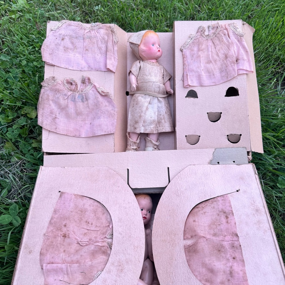 Vintage 1940s quintuplets and nurse doll set